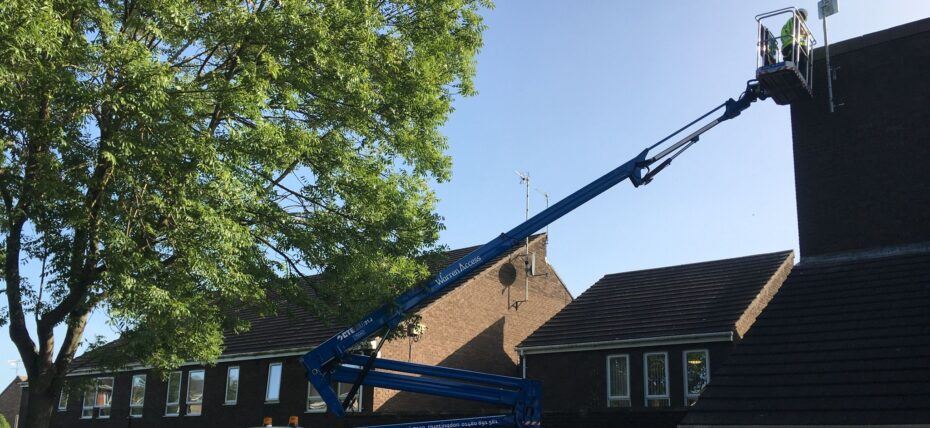 Cherry picker on hire from Warren Access for roof inspection