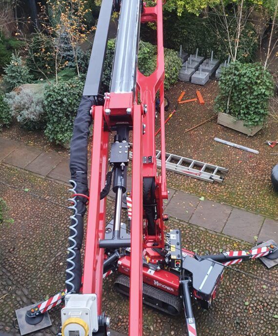 Warren Access provide 17m Hinowa 17.75 spider lift to trim ivy at The George of Stamford